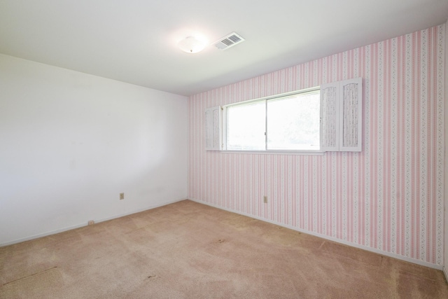 1902 S Memorial Ct, Pasadena, TX 77502 - empty room featuring carpet flooring and baseboards