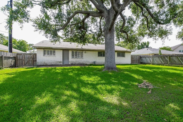 1902 S Memorial Ct, Pasadena, TX 77502 - rear view of property with brick siding