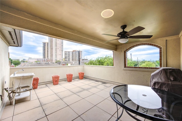 3331 Bingham Manor Ln, Houston, TX 77056 - view of patio / terrace with ceiling fan and a view of city