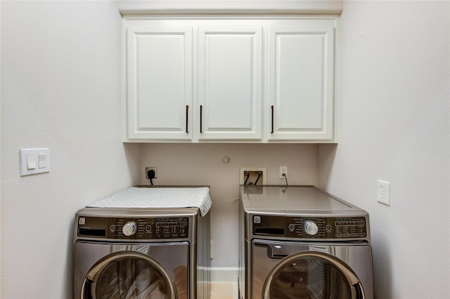 3331 Bingham Manor Ln, Houston, TX 77056 - washroom featuring cabinet space and washer and clothes dryer