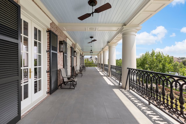 view of patio with french doors and ceiling fan