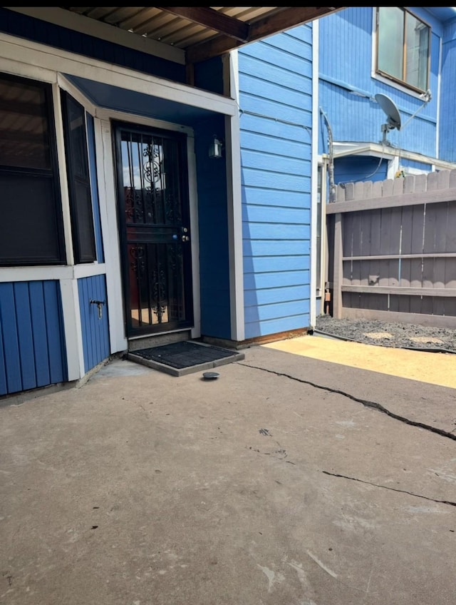 13424 Castilian Dr Unit 113, Houston, TX 77015 - doorway to property featuring fence