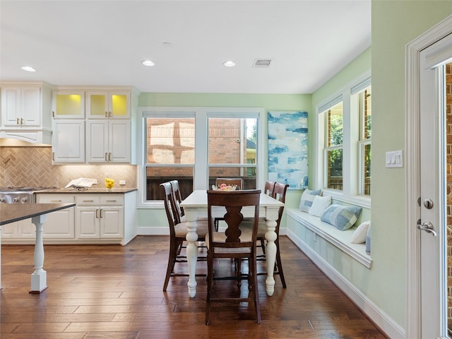 4635 Beech St, Bellaire, TX 77401 - dining area with dark wood finished floors, recessed lighting, and baseboards
