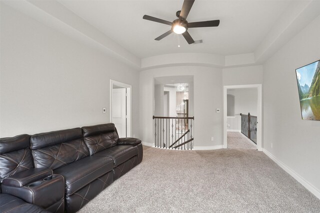 9223 Holloway Cliff Ln, Cypress, TX 77433 - living area featuring carpet floors, ceiling fan, and baseboards