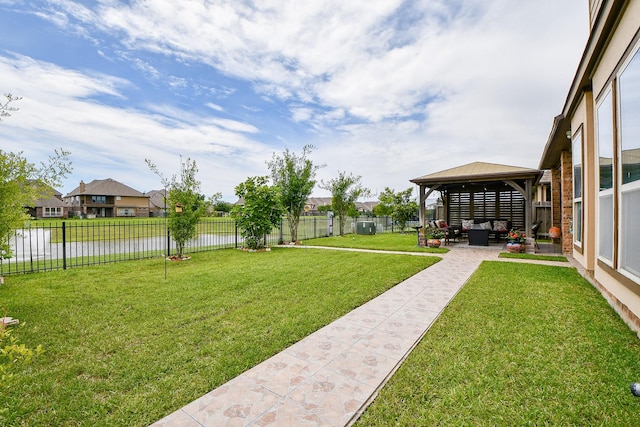 4414 Tilbury Trl, Richmond, TX 77407 - view of yard featuring a gazebo, an outdoor hangout area, a water view, a patio, and a residential view