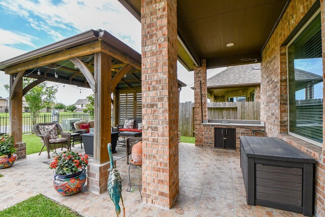 4414 Tilbury Trl, Richmond, TX 77407 - view of patio with a fenced backyard, a gazebo, and area for grilling