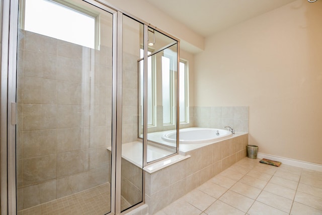 4414 Tilbury Trl, Richmond, TX 77407 - full bath with plenty of natural light, tile patterned flooring, a bath, and a shower stall