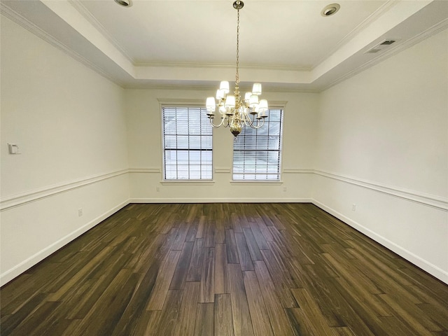 1265 Ridgewood Pl, Houston, TX 77055 - empty room with dark wood-type flooring, a tray ceiling, a chandelier, ornamental molding, and baseboards