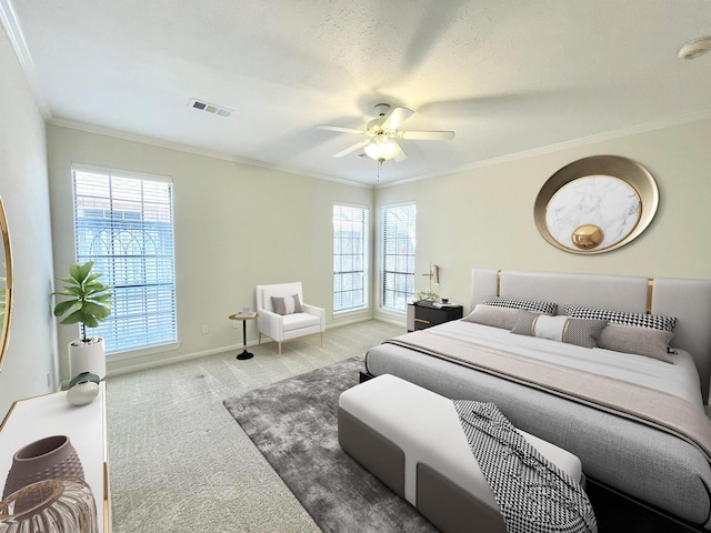 1265 Ridgewood Pl, Houston, TX 77055 - carpeted bedroom featuring crown molding, baseboards, and a ceiling fan