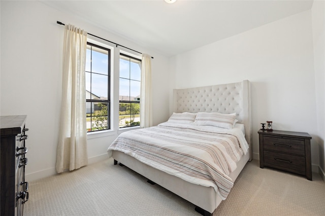 21502 Lowlands Ln, Cypress, TX 77433 - bedroom featuring light carpet and baseboards