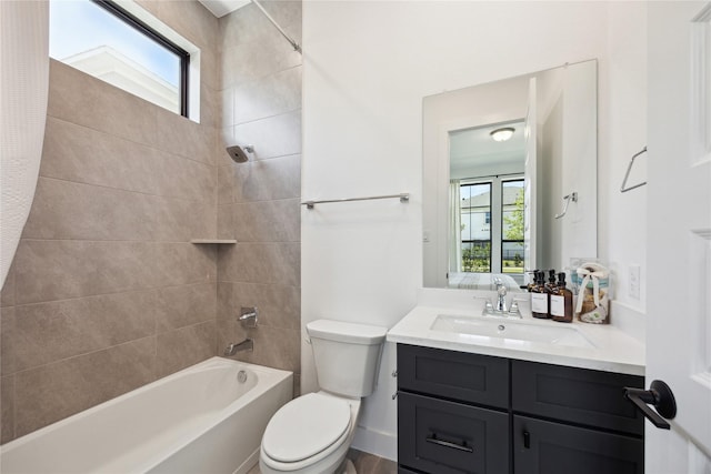 21502 Lowlands Ln, Cypress, TX 77433 - bathroom featuring healthy amount of natural light, shower / bathtub combination, toilet, and vanity