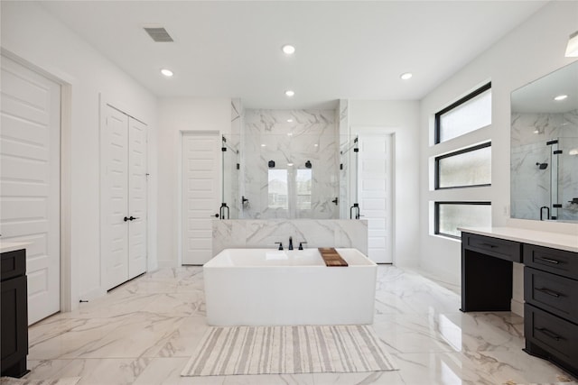 21502 Lowlands Ln, Cypress, TX 77433 - bathroom featuring marble finish floors, a marble finish shower, a closet, vanity, and recessed lighting