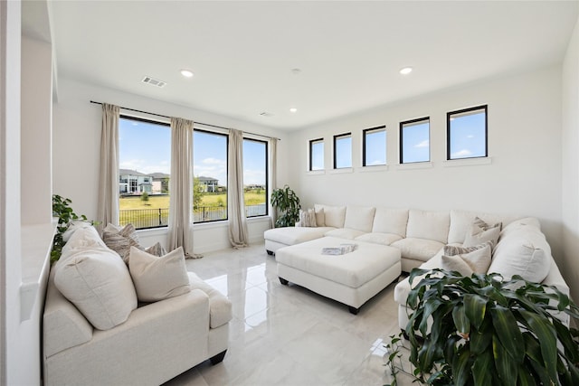 21502 Lowlands Ln, Cypress, TX 77433 - living room with recessed lighting and light marble finish flooring