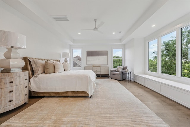 bedroom featuring multiple windows, wood finished floors, recessed lighting, and ceiling fan