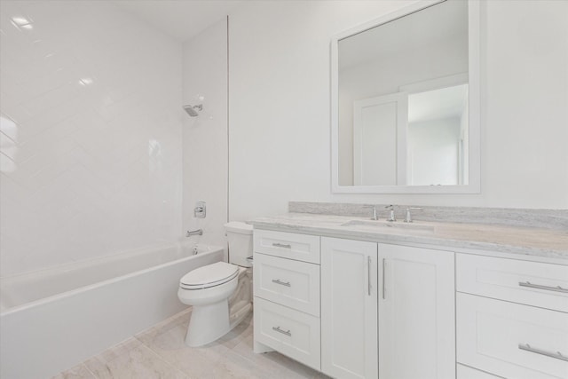bathroom featuring toilet, vanity, and shower / washtub combination