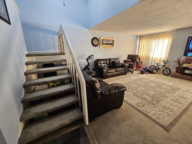 9807 Bent Branch Ln, Dallas, TX 75243 - living area featuring stairway, carpet, and a textured ceiling