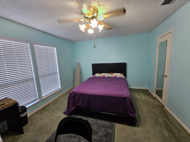 9807 Bent Branch Ln, Dallas, TX 75243 - carpeted bedroom with a textured ceiling, a ceiling fan, and baseboards