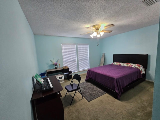 9807 Bent Branch Ln, Dallas, TX 75243 - carpeted bedroom with a textured ceiling and a ceiling fan