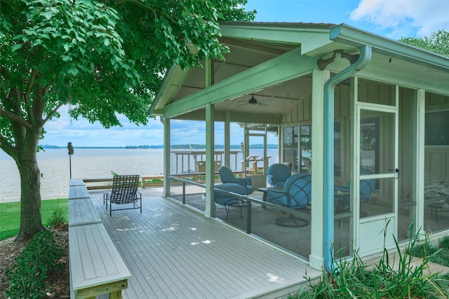 1378 Landing Way, Trinity, TX 75862 - wooden deck with a sunroom, a water view, and a ceiling fan