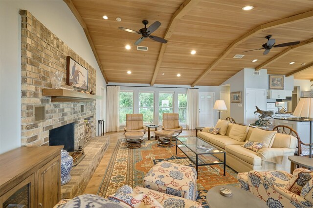 1378 Landing Way, Trinity, TX 75862 - living area featuring ceiling fan, wooden ceiling, light wood-style flooring, a brick fireplace, and recessed lighting