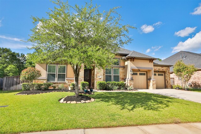 506 Chirping Sparrow Ct, Pinehurst, TX 77362 - view of property hidden behind natural elements with a garage, driveway, stone siding, and stucco siding