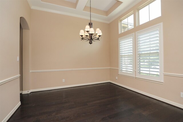 506 Chirping Sparrow Ct, Pinehurst, TX 77362 - unfurnished room with wood finished floors, ornamental molding, a chandelier, and baseboards
