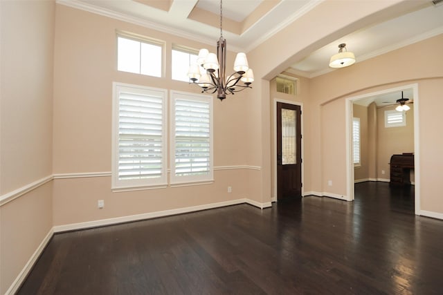 506 Chirping Sparrow Ct, Pinehurst, TX 77362 - empty room featuring arched walkways, healthy amount of natural light, a chandelier, and ornamental molding