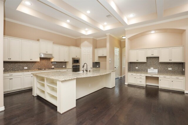506 Chirping Sparrow Ct, Pinehurst, TX 77362 - kitchen featuring appliances with stainless steel finishes, open shelves, under cabinet range hood, backsplash, and beam ceiling
