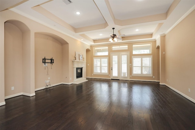 506 Chirping Sparrow Ct, Pinehurst, TX 77362 - unfurnished living room featuring a ceiling fan, wood finished floors, coffered ceiling, a glass covered fireplace, and baseboards