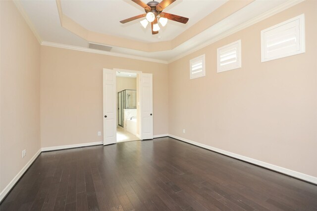 506 Chirping Sparrow Ct, Pinehurst, TX 77362 - unfurnished room featuring a tray ceiling, ceiling fan, wood finished floors, baseboards, and ornamental molding