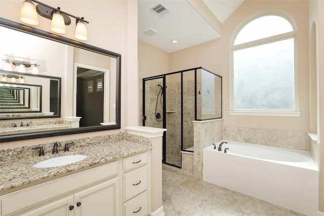 506 Chirping Sparrow Ct, Pinehurst, TX 77362 - bathroom with a bath, a shower stall, and vanity