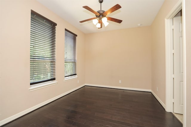 506 Chirping Sparrow Ct, Pinehurst, TX 77362 - unfurnished room featuring ceiling fan, dark wood-style floors, and baseboards
