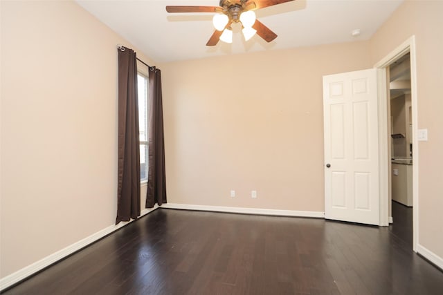 506 Chirping Sparrow Ct, Pinehurst, TX 77362 - empty room with a ceiling fan, dark wood-style floors, baseboards, and a smoke detector
