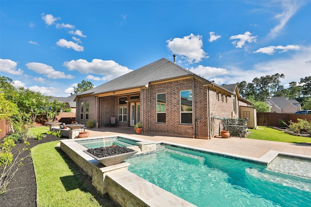 506 Chirping Sparrow Ct, Pinehurst, TX 77362 - view of swimming pool with a pool with connected hot tub and a patio