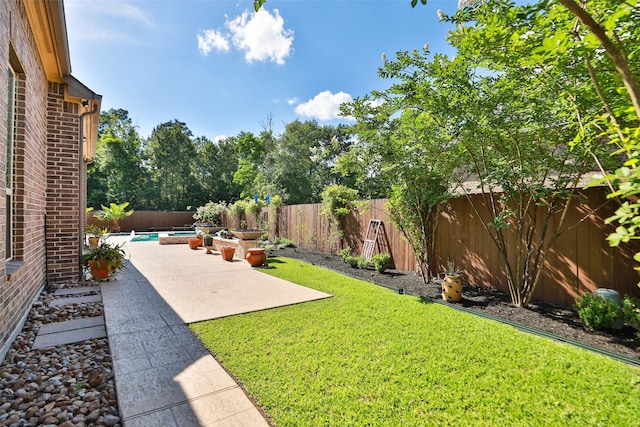506 Chirping Sparrow Ct, Pinehurst, TX 77362 - view of yard with a patio