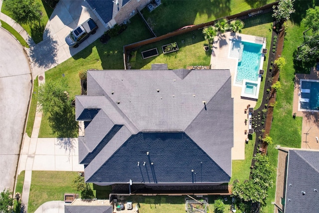 506 Chirping Sparrow Ct, Pinehurst, TX 77362 - view from above of property with a pool