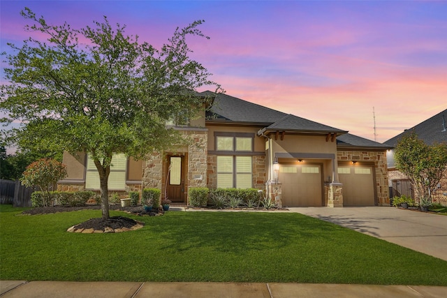 506 Chirping Sparrow Ct, Pinehurst, TX 77362 - view of front facade with stone siding, driveway, a garage, and stucco siding