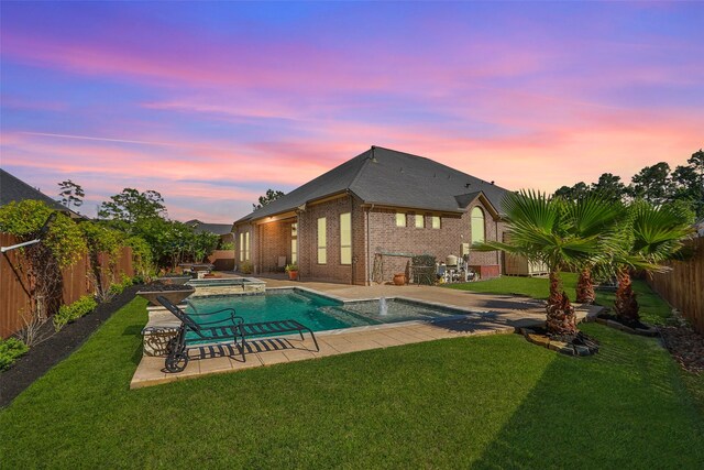 506 Chirping Sparrow Ct, Pinehurst, TX 77362 - view of pool featuring a patio area and a pool with connected hot tub