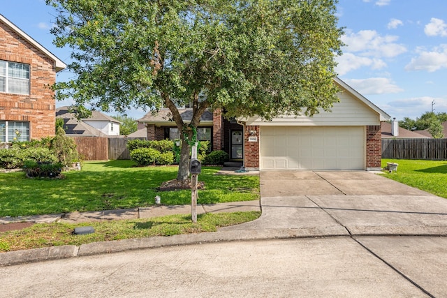 8414 Coriander Ln, Baytown, TX 77521 - view of front of house featuring brick siding, driveway, and a garage