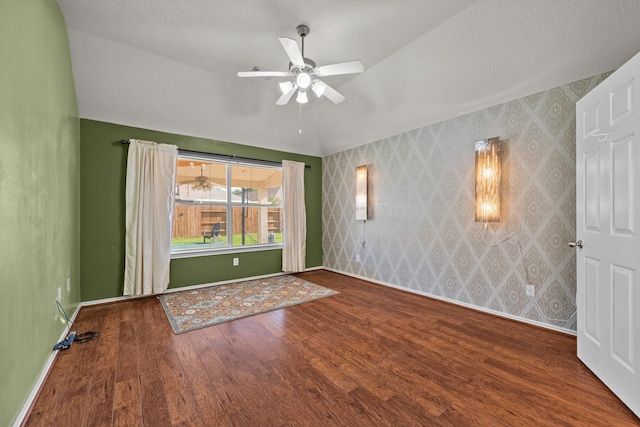 8414 Coriander Ln, Baytown, TX 77521 - empty room featuring baseboards, wood finished floors, and a ceiling fan