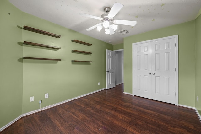 8414 Coriander Ln, Baytown, TX 77521 - unfurnished bedroom featuring wood finished floors, baseboards, a closet, and a ceiling fan