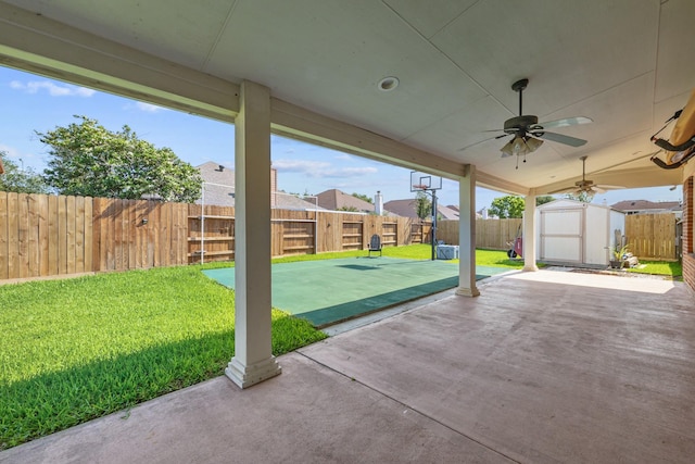 8414 Coriander Ln, Baytown, TX 77521 - view of patio / terrace with a storage unit, an outdoor structure, a ceiling fan, and a residential view