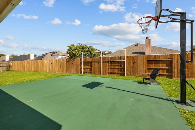 8414 Coriander Ln, Baytown, TX 77521 - view of basketball court with fence