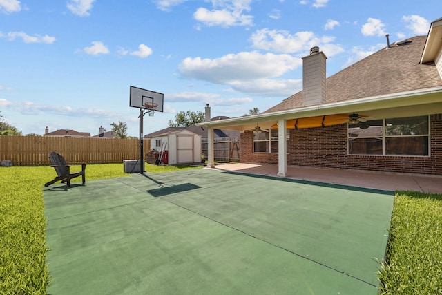 8414 Coriander Ln, Baytown, TX 77521 - view of basketball court featuring a storage shed