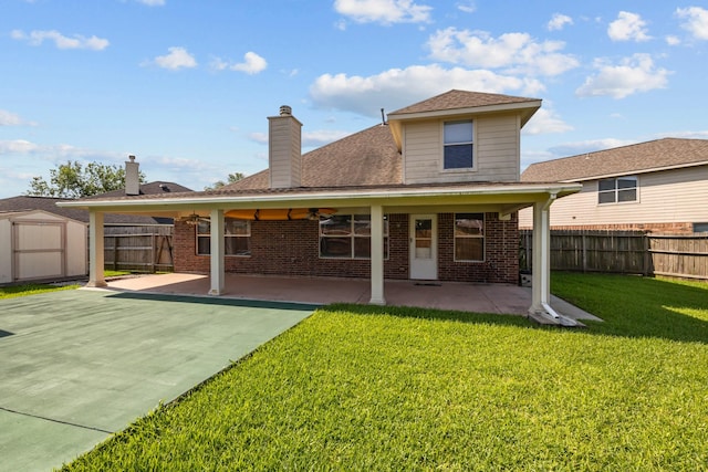 8414 Coriander Ln, Baytown, TX 77521 - rear view of property featuring a patio area, a shed, an outdoor structure, and brick siding