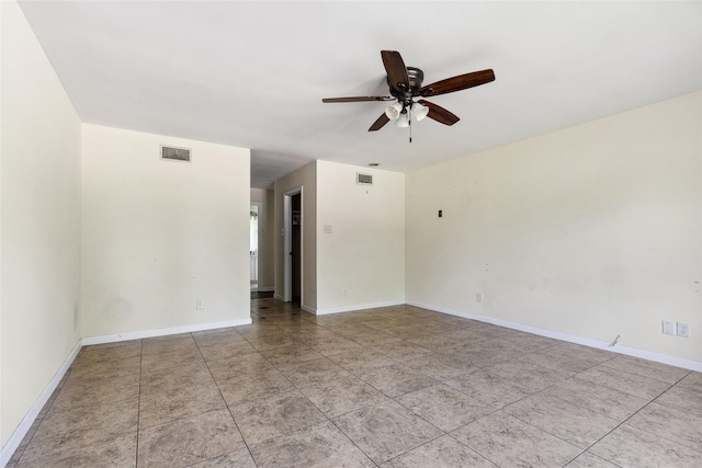 2368 Old Columbus Rd N, Sealy, TX 77474 - empty room featuring ceiling fan, baseboards, and light tile patterned flooring