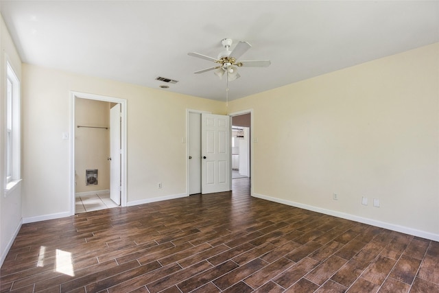 2368 Old Columbus Rd N, Sealy, TX 77474 - spare room featuring ceiling fan, wood finished floors, and baseboards
