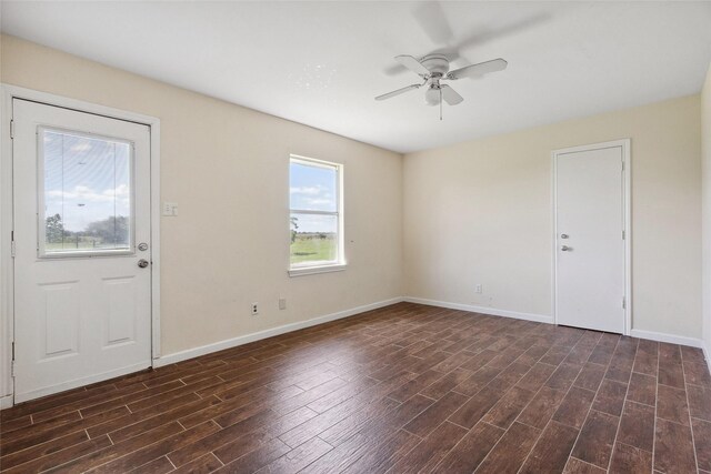 2368 Old Columbus Rd N, Sealy, TX 77474 - foyer entrance with a ceiling fan, dark wood-style floors, and baseboards