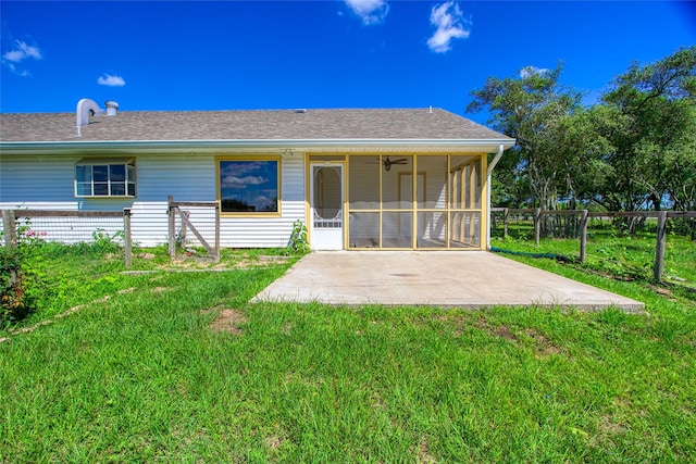 2368 Old Columbus Rd N, Sealy, TX 77474 - rear view of property with a sunroom, a patio area, and a shingled roof