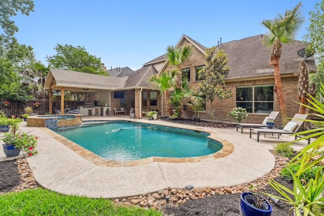 15730 Hunters Lake Way, Houston, TX 77044 - view of swimming pool featuring a patio, ceiling fan, and a pool with connected hot tub